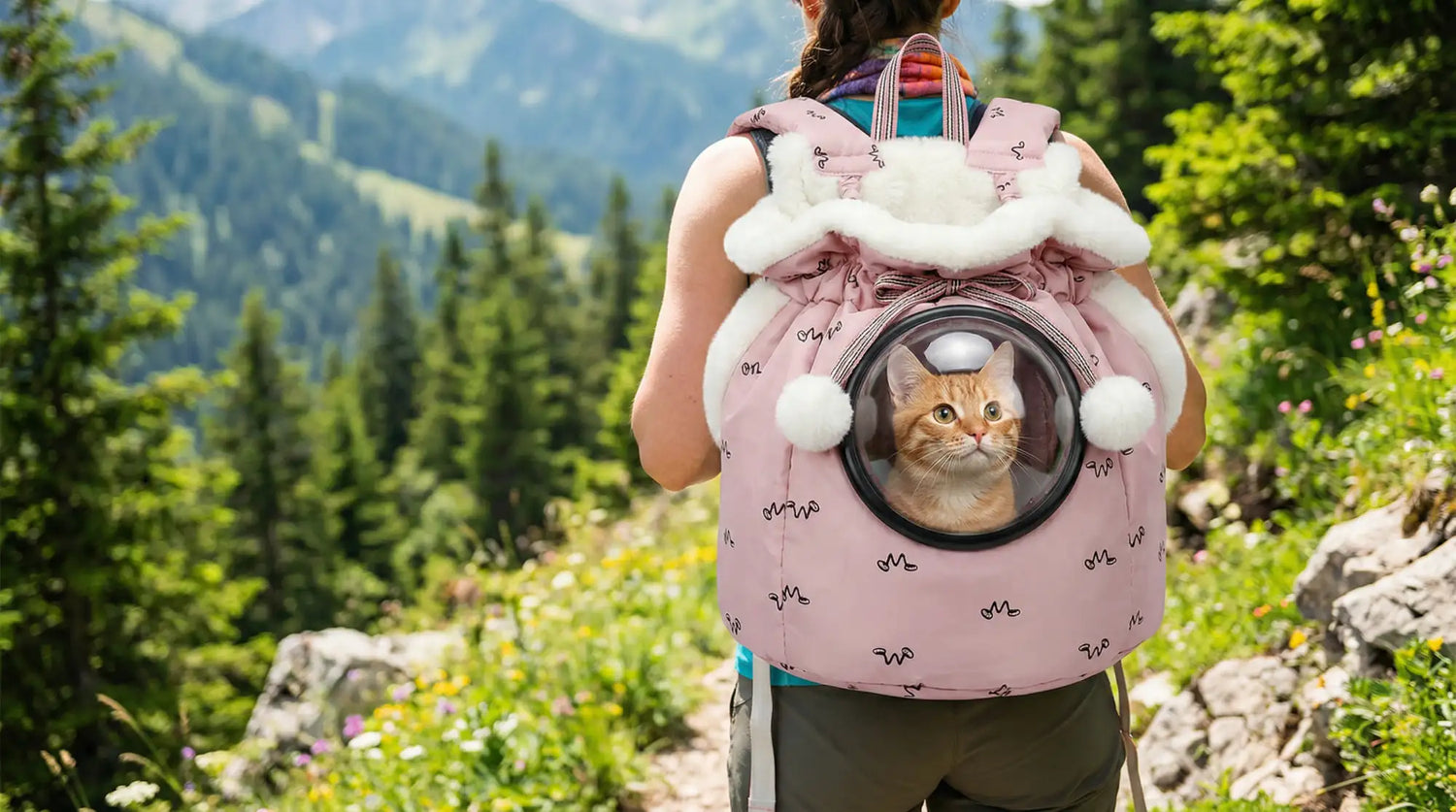 Pink cat carrier backpack with white fur trim and a clear circular window.